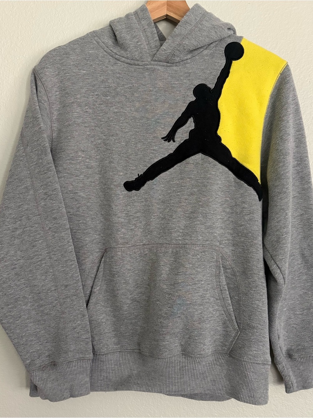 Jordan Grey Hoodie with Black Jumpman and Yellow Shoulder Accent